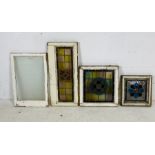 Three various sized stained glass windows, along with one other