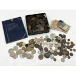 A collection of various coinage and banknotes including a number of bun pennies