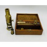 A 19th century field microscope in mahogany case, the brass body inscribed "West, Fleet Street,