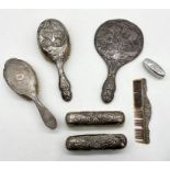 A collection of hallmarked silver dressing table brushes, mirror etc along with a small silver