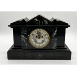 A slate mantle clock with enamel dial
