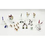 A collection of glass animals including huntsman (A/F) with hounds and foxes, dogs, etc.