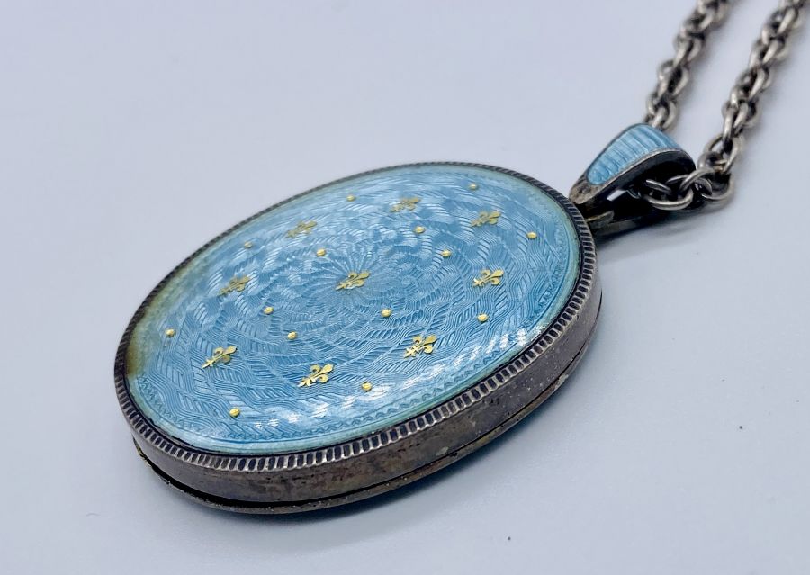 A small collection of silver jewellery including an enamelled silver locket, chains, pendants etc. - Image 2 of 2