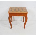 A mid century oak chess table, with lift up lid - length 51cm, depth 51.5cm, height 51cm