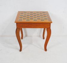 A mid century oak chess table, with lift up lid - length 51cm, depth 51.5cm, height 51cm