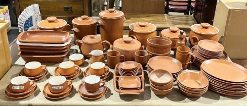 A large Honiton Pottery part dinner service including dinner plates, casserole dishes. side plate,