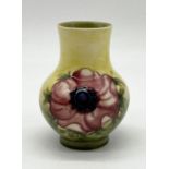A small Moorcroft Anemone pattern vase with mark to base - height 10cm