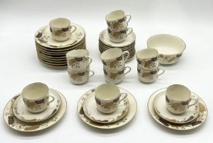 A M. Rendon Limoges part tea set decorated with gilt fern motif and comprising of twelves trios