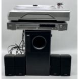 A Bose Acousticmass 5 Series lll surround sound speaker system along with a Sony DVD/CD player and