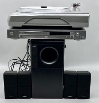 A Bose Acousticmass 5 Series lll surround sound speaker system along with a Sony DVD/CD player and