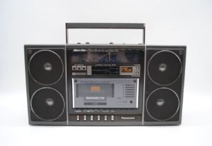 A Panasonic Ambience Stereo RX-F32L radio and cassette player, with cable