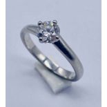 A platinum diamond solitaire ring, the diamond measuring 0.5ct