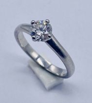 A platinum diamond solitaire ring, the diamond measuring 0.5ct