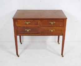 An Edwardian inlaid mahogany chest of four drawers, raised on tapering legs - length 89cm, depth