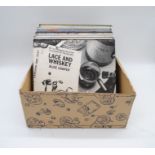 A quantity of 12" vinyl records, including Alice Cooper, The Who, Bob Dylan, The Beach Boys, The