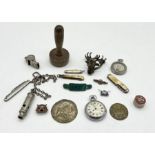 A collection of interesting items including whistles, Ingersoll pocket watch, enamelled Railway