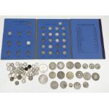 A collection of silver coinage including 1924 peace dollar, threepenny bits, 1896 South African 2