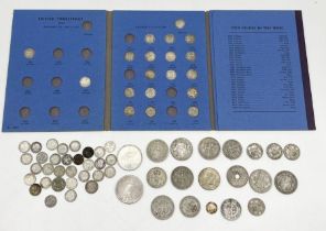 A collection of silver coinage including 1924 peace dollar, threepenny bits, 1896 South African 2