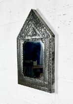 A pressed metal modern wall mirror, height 59cm