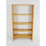 A modern freestanding bookcase - length 80cm, depth 34cm, height 146cm