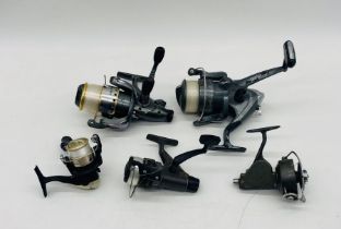 A collection of five fixed fishing reels including a Cypry 6000 Freespool, Red Wolf etc