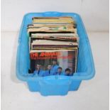 A quantity of 7" vinyl records, including The Beatles, The Animals, Queen, UB40, The Style