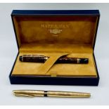 A Waterman "Ideal" pen in original box along with one other