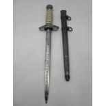 A German Third Reich Luftwaffe 2nd model dagger and scabbard, with Nazi era eagle cross guard and