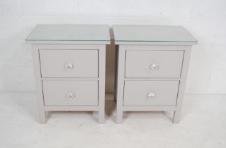 A pair of modern bedside cabinets with two drawers - length 54cm, depth 38cm, height 66cm