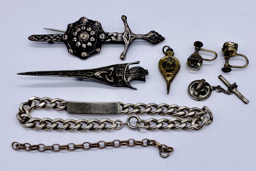 A small collection of silver jewellery including a pair of antique paste earrings