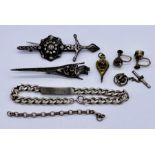 A small collection of silver jewellery including a pair of antique paste earrings