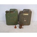 Two 20L jerry cans along with an oil can etc.