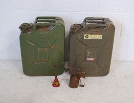 Two 20L jerry cans along with an oil can etc.