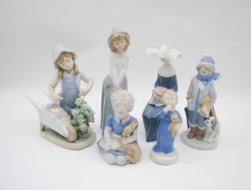 A collection of Lladro and Nao figurines.