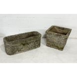 Two weathered reconstituted stone garden planters