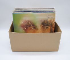 A quantity of various 12" vinyl records, including George Harrison, John Lennon, Paul McCartney,