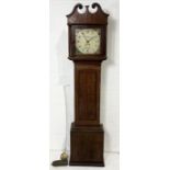 A turn of the century oak long case clock by W. Perry of Hockworthy with subsidiary second dial