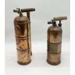 Two antique copper fire extinguishers, one with French instructions to front