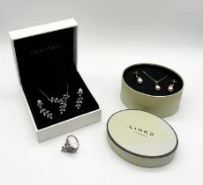 A set of Pandora 925 silver jewellery including pendant on chain, earrings and ring along with a