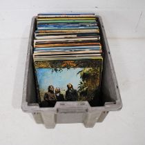 A quantity of 12" vinyl records, including America, Gerry Rafferty, Gordon Lightfoot, Elvis Presley,