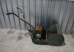 A Ransomes 18" Marquis cylinder petrol garden lawn mower, with grass box