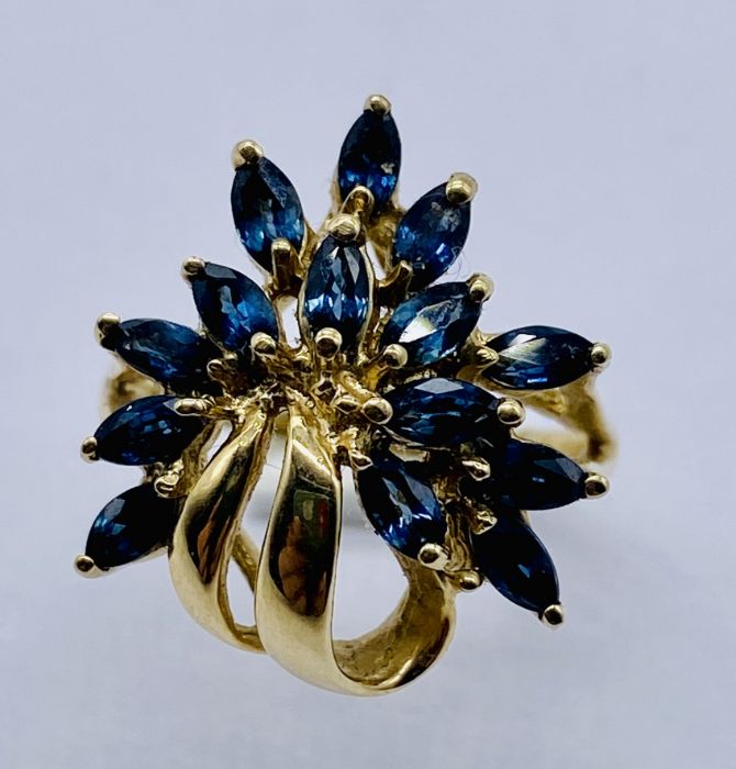 A 9ct gold topaz dress ring