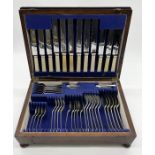 A wooden cased canteen of cutlery by R.F. Mosley Ltd.
