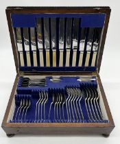 A wooden cased canteen of cutlery by R.F. Mosley Ltd.