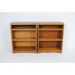 A pair of oak freestanding bookcases, height 77cm.