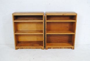 A pair of oak freestanding bookcases, height 77cm.