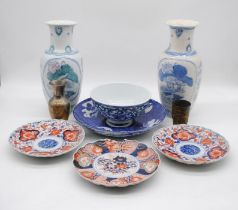 A quantity of Oriental ceramics and metal ware including plates, vases etc.