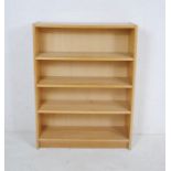 A modern freestanding bookcase - length 80cm, depth 28cm, height 106cm