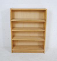 A modern freestanding bookcase - length 80cm, depth 28cm, height 106cm