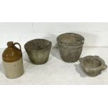 A collection of items including two garden planters, stoneware jar and small stone mortar